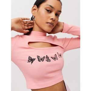 NWT urban outfitters pink long sleeve crop top with cutout and butterflies